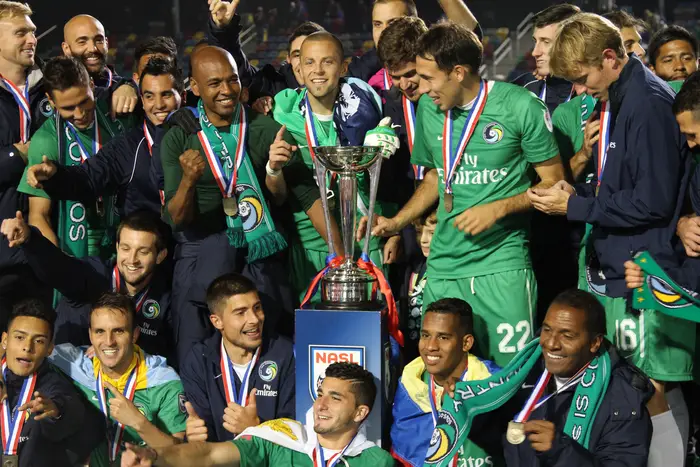 The Cosmos celebrate their first NASL Soccer Bowl championship since 1982.